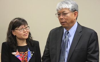 Representative from the Chinese Delegation meets with CalHR Analyst Dan Tokunaga.